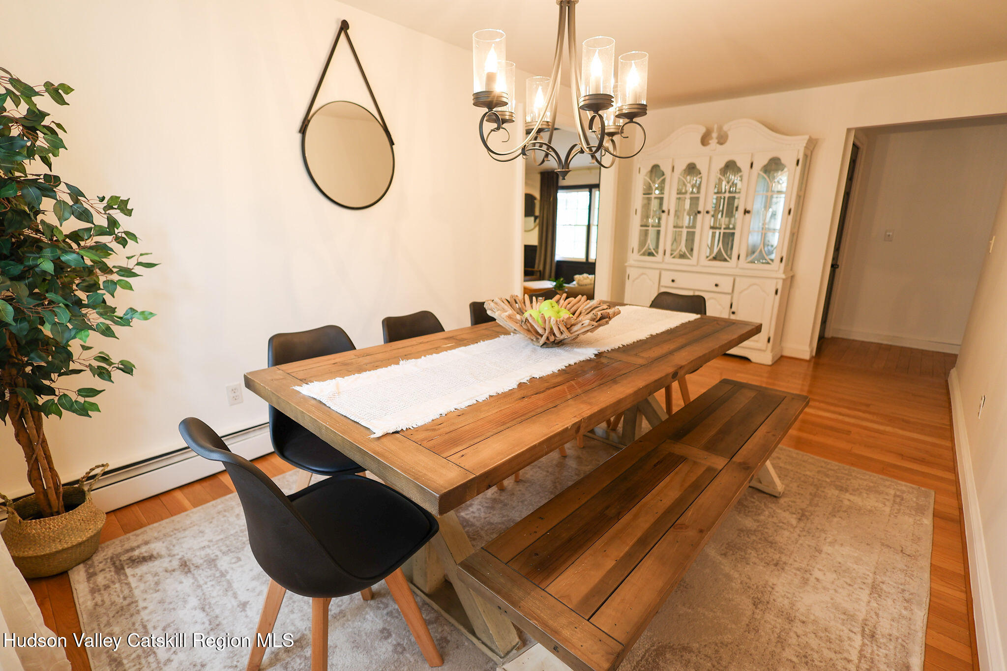 523 Mitchell Hollow Road Windham, NY 12496 - Photo 21 of 59 a view of a dining room with furniture and chandelier