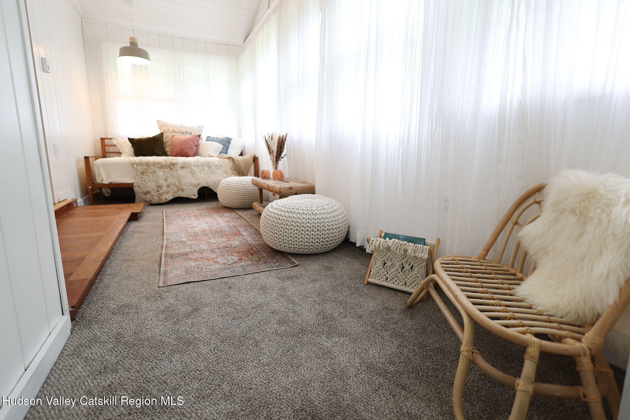 523 Mitchell Hollow Road Windham, NY 12496 - Photo 30 of 59 a living room with furniture and a window
