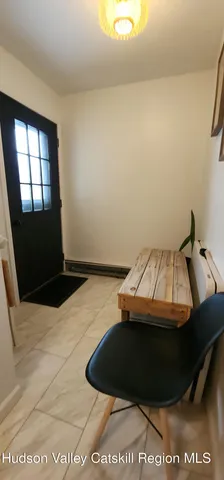 a view of deck with mountain view and wooden floor