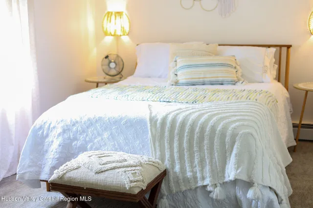 a bathroom with a tub sink and toilet