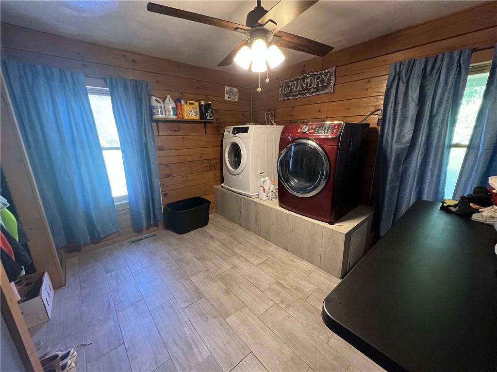 1149 School Road Apollo, PA 15613 - Photo 19 of 32 a view of a hallway with washer and dryer