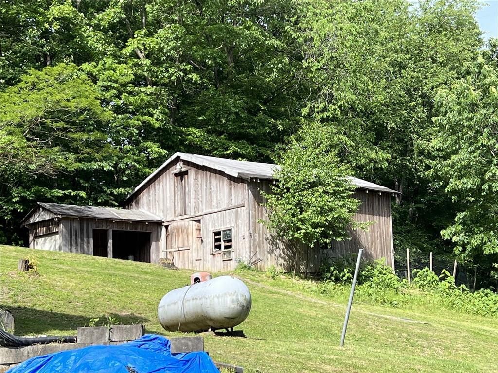 1149 School Road Apollo, PA 15613 - Photo 30 of 32 a view of a house with backyard and sitting area