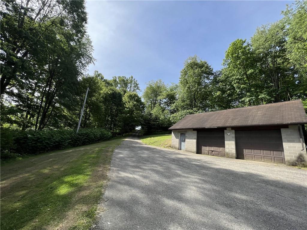 1149 School Road Apollo, PA 15613 - Photo 3 of 32 a view of an house with backyard space and a tree