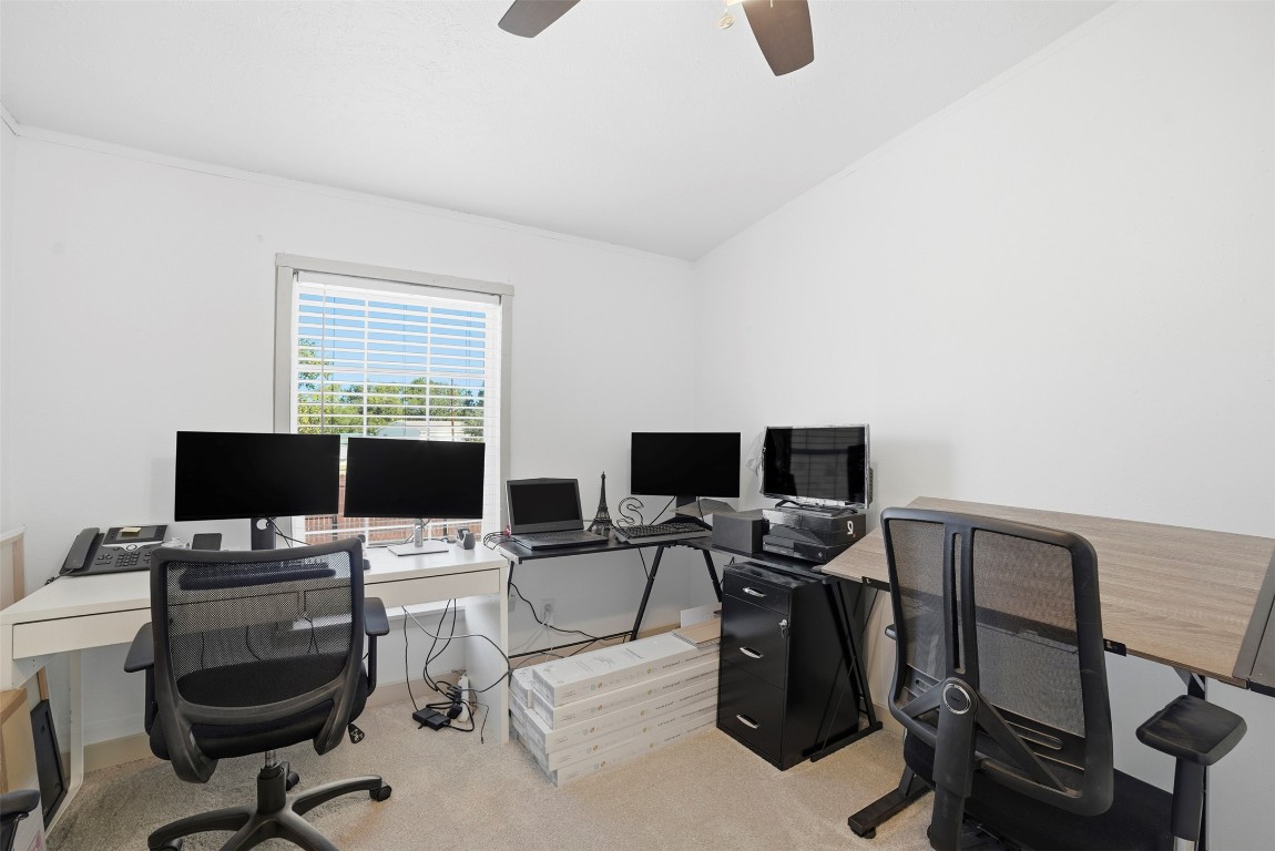 4048 Sutherland Springs Road Seguin, TX 78155 - Photo 13 of 23 a view of a workspace with a window