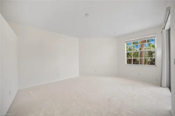 a spacious bathroom with a double vanity sink mirror and double