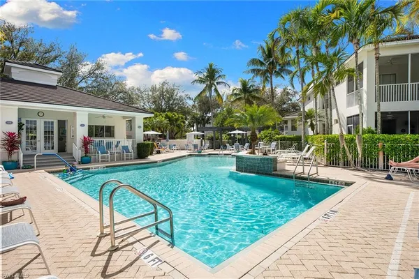 a view of a yard with patio area