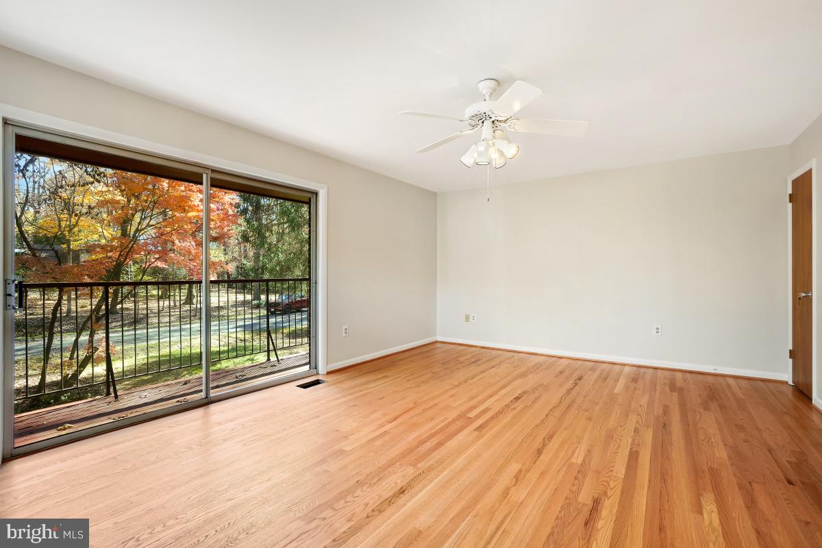 2606 Deerdell Lane Reston, VA 20191 - Photo 27 of 49 wooden floor in an empty room with a window