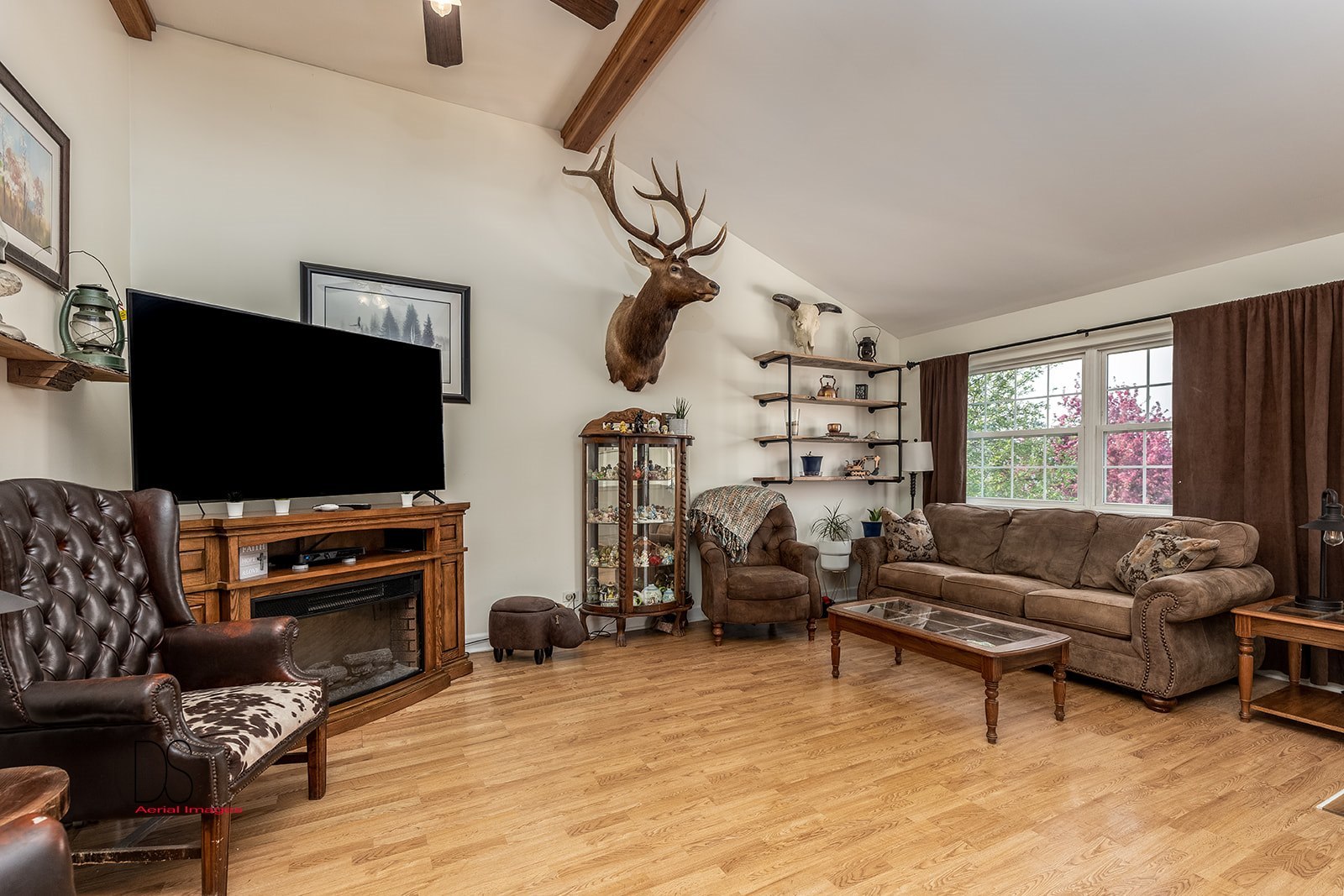 2064 North 3569th Road Serena, IL 60549 - Photo 12 of 36 a living room with furniture and a flat screen tv