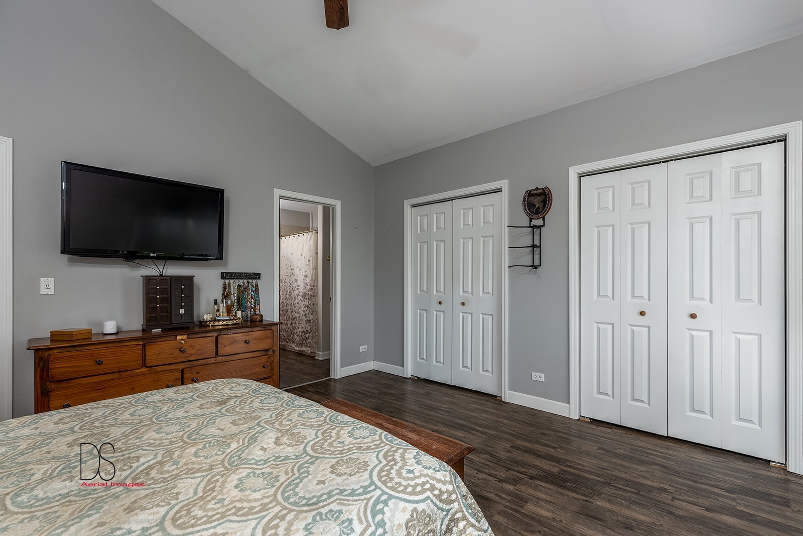 2064 North 3569th Road Serena, IL 60549 - Photo 18 of 36 a bedroom with a bed and a flat screen tv