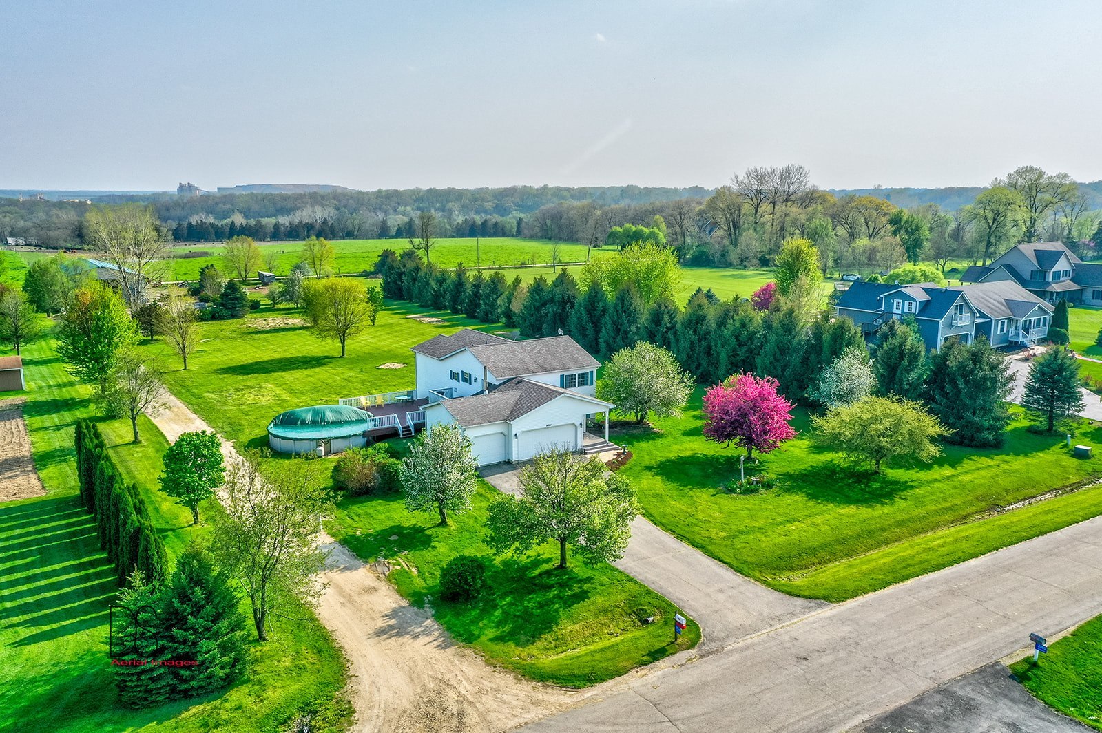 2064 North 3569th Road Serena, IL 60549 - Photo 2 of 36 a front view of a house with a yard
