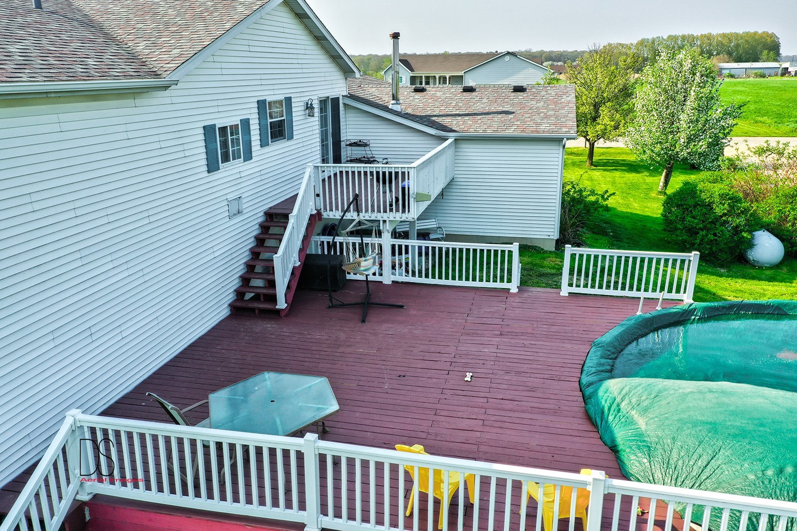 2064 North 3569th Road Serena, IL 60549 - Photo 26 of 36 a view of a house with a small yard and deck