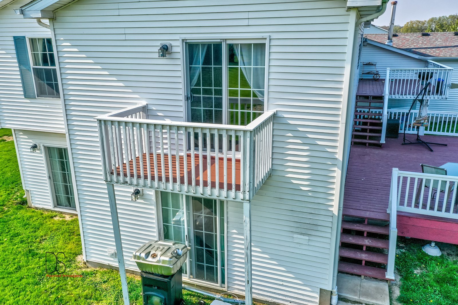 2064 North 3569th Road Serena, IL 60549 - Photo 29 of 36 a view of a house with a deck and furniture