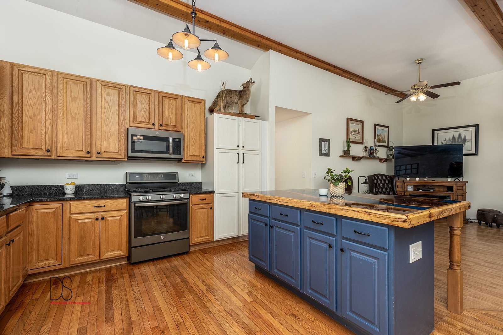 2064 North 3569th Road Serena, IL 60549 - Photo 10 of 36 a kitchen with stainless steel appliances granite countertop a stove top oven a sink dishwasher and a microwave oven with cabinets
