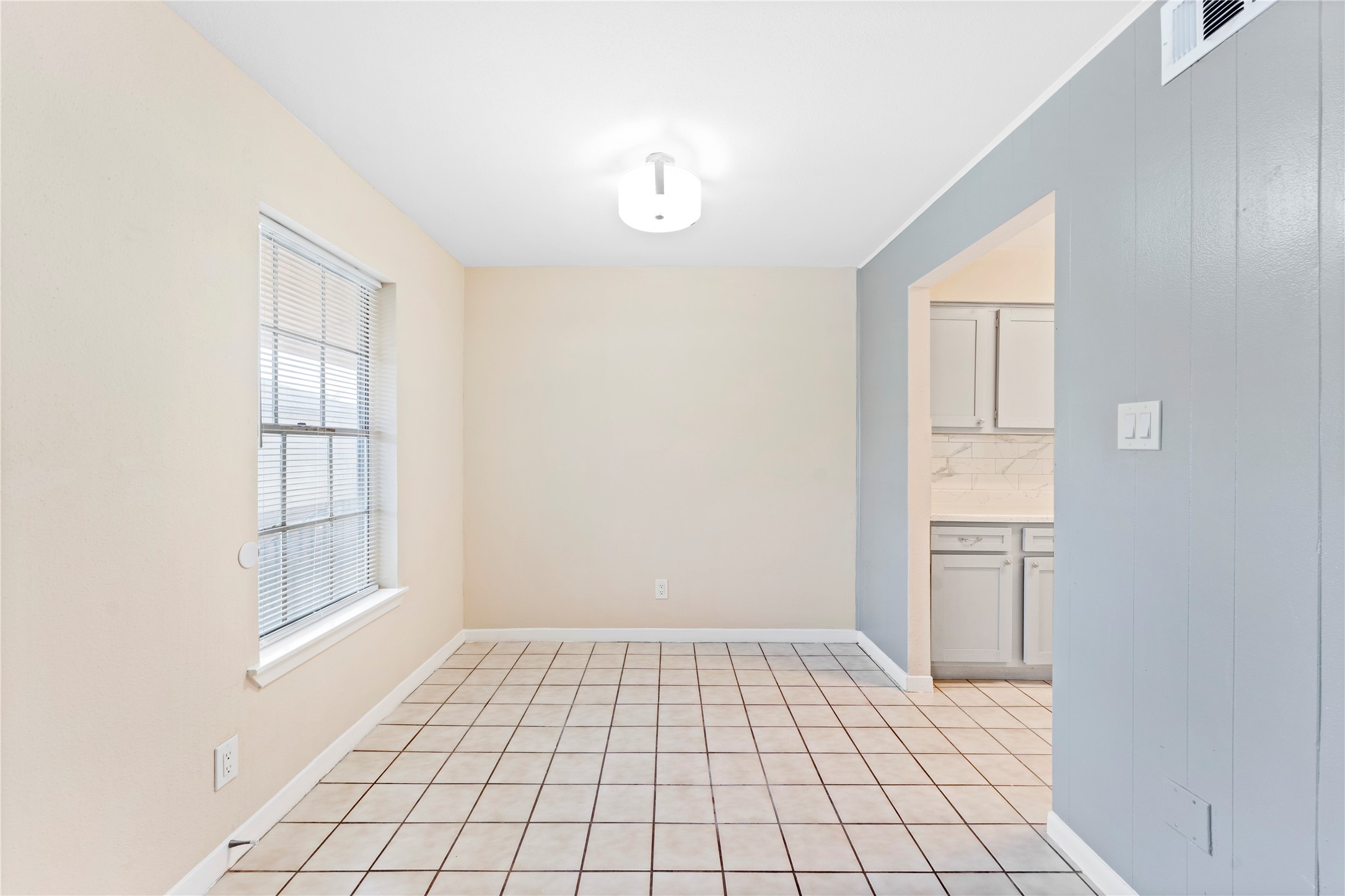 3316 Burke Road, Unit 43 Pasadena, TX 77504 - Photo 5 of 15 a view of an empty room with windows