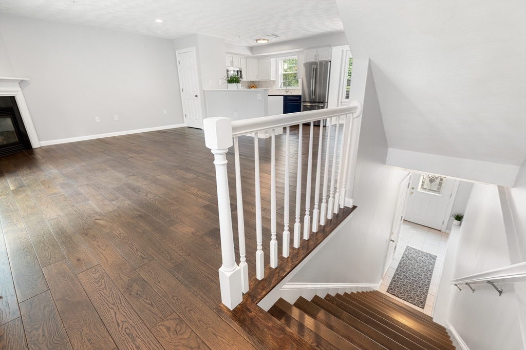 2 Ricciuti Drive, Unit 9 Quincy, MA 02169 - Photo 19 of 40 a view of a hallway with windows