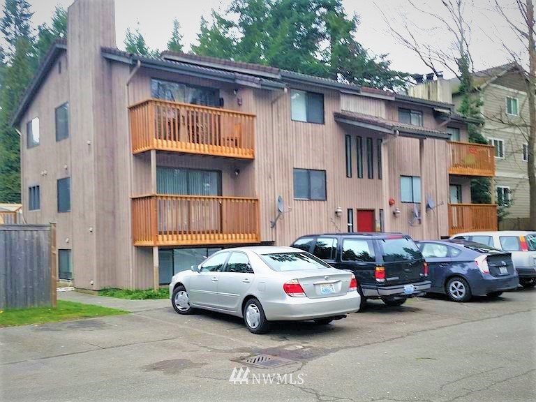 a car parked in front of a house