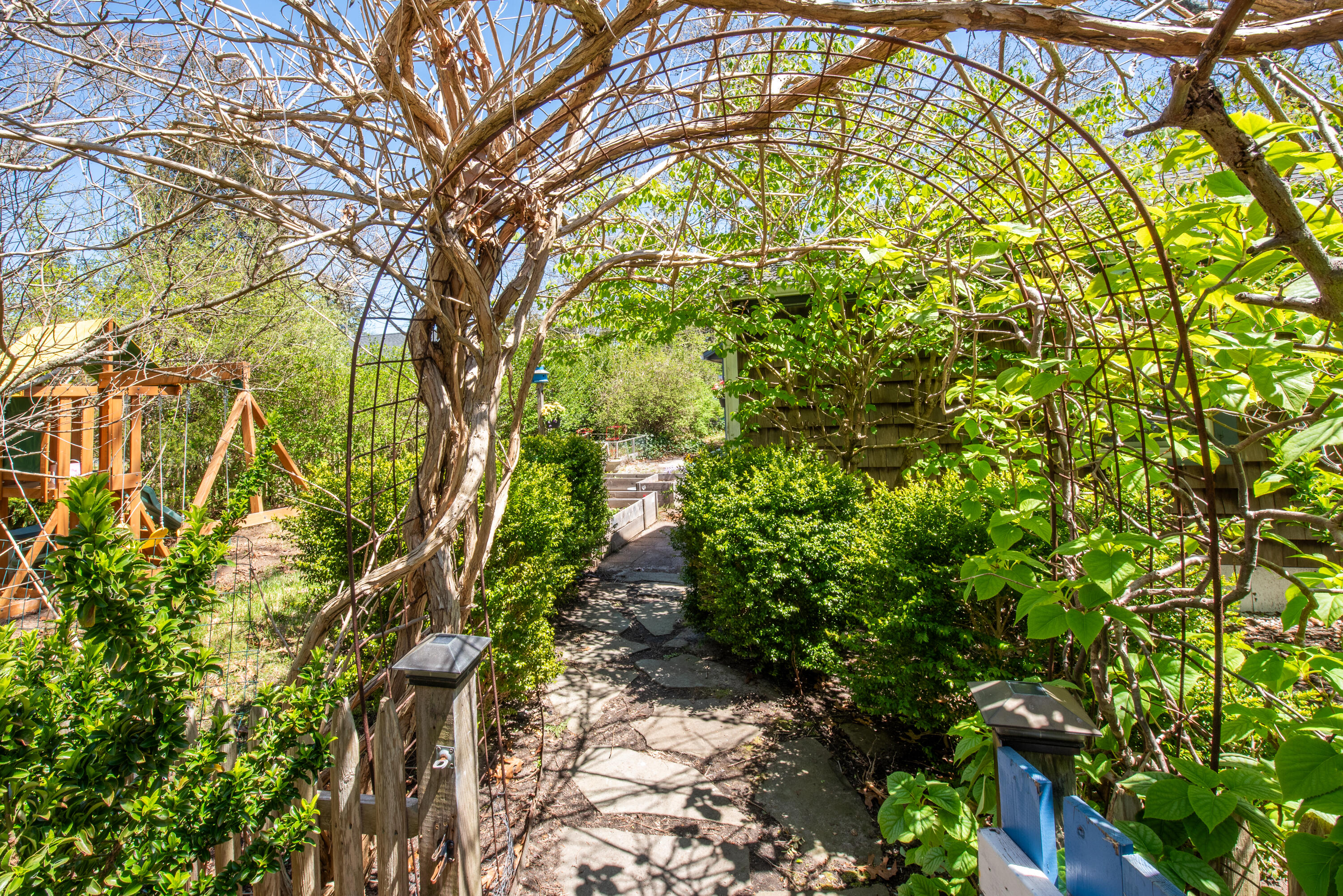 35 Old County Road, Unit 1 Eastham, MA 02642 - Photo 19 of 30 a backyard of a house with lots of trees