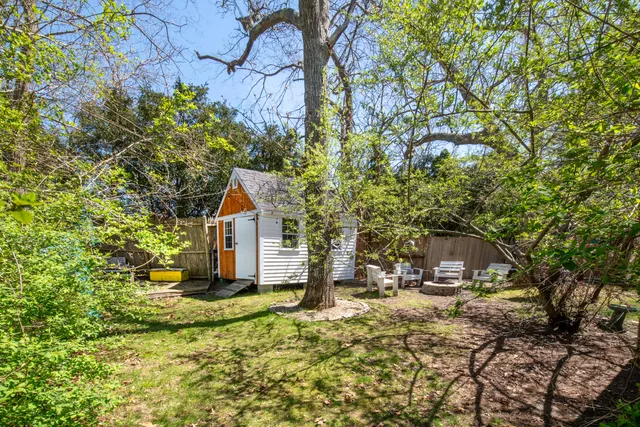 a house with trees in front of it