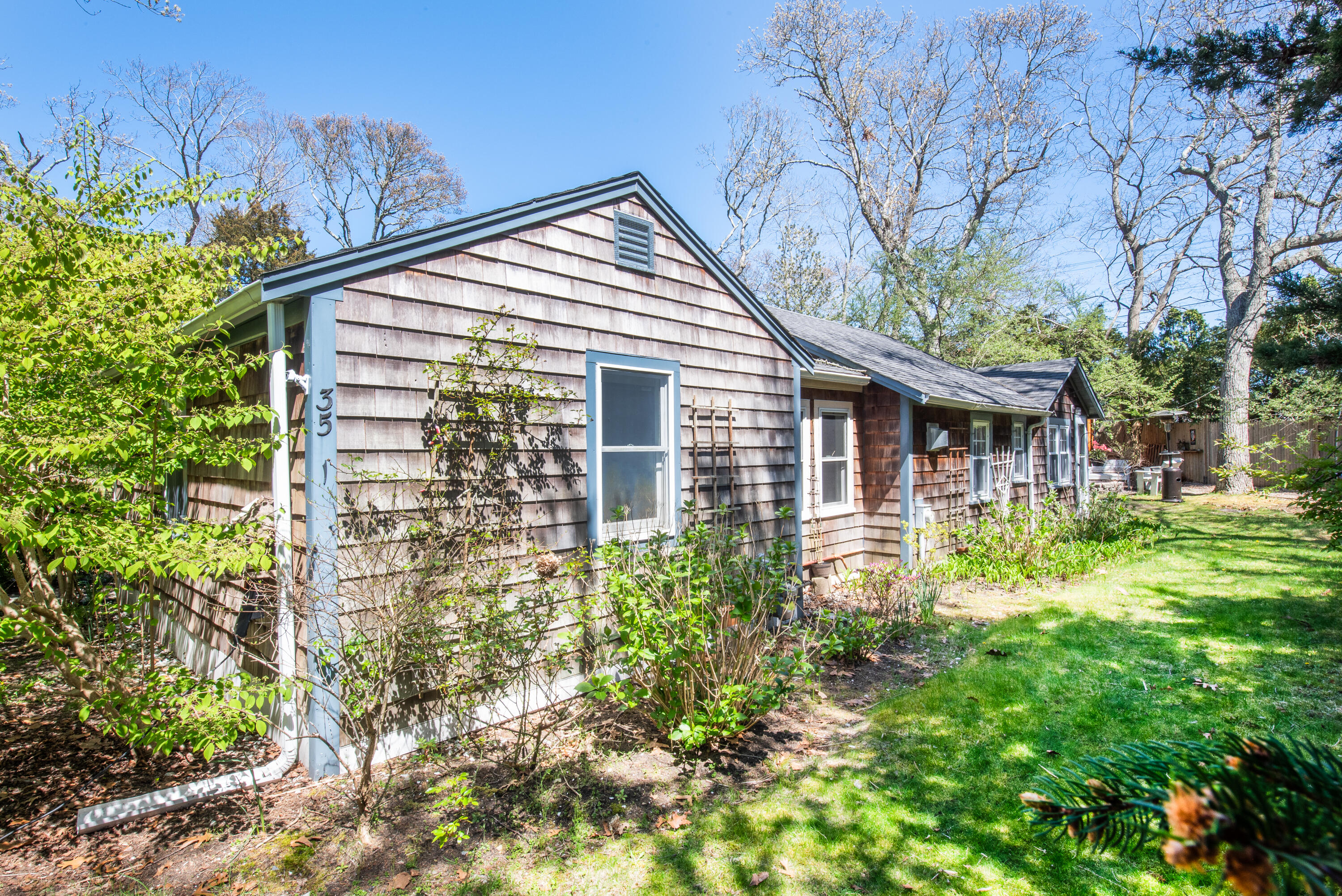 35 Old County Road, Unit 1 Eastham, MA 02642 - Photo 29 of 30 a view of house with backyard and garden