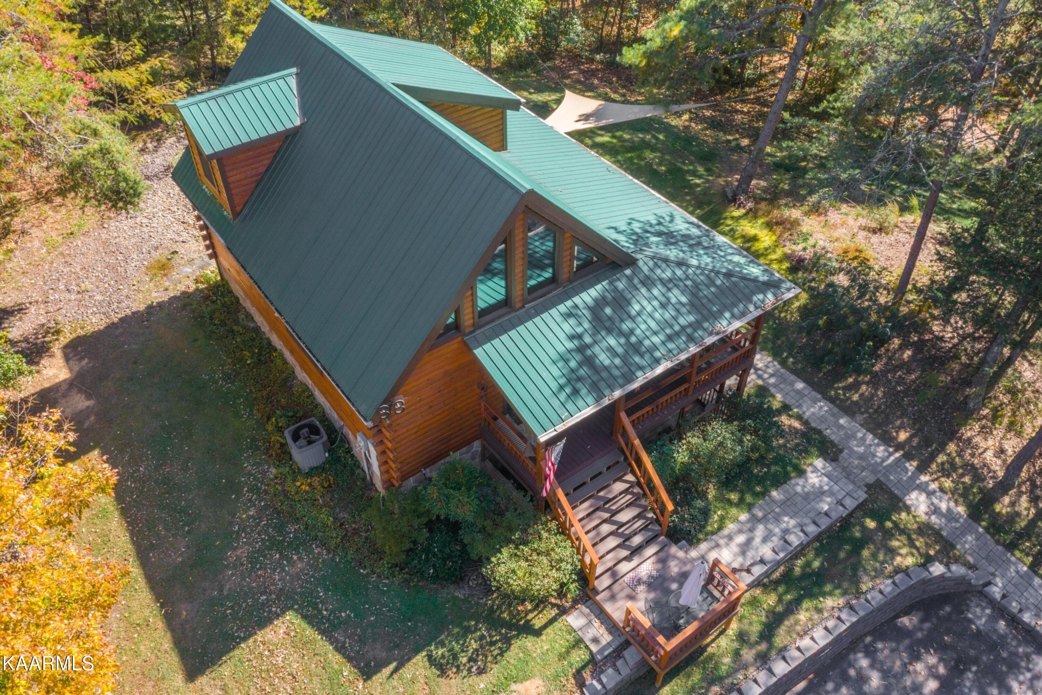 1524 Sandy Ridge Road Dandridge, TN 37725 - Photo 17 of 42 a backyard of a house with lots of green space