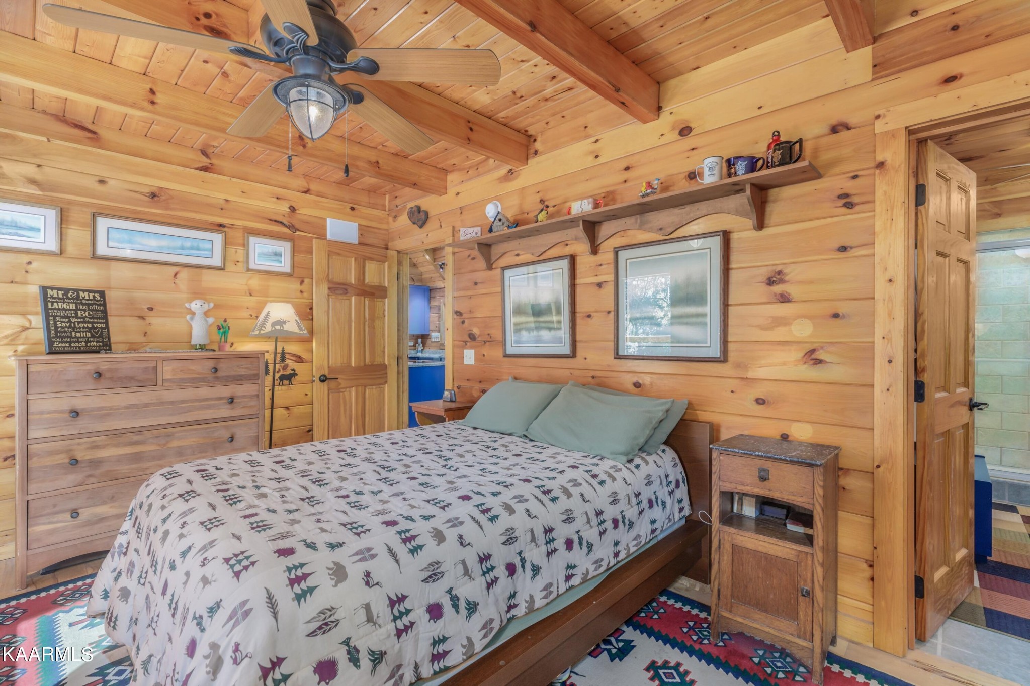 1524 Sandy Ridge Road Dandridge, TN 37725 - Photo 31 of 42 a bedroom with a bed and a dresser
