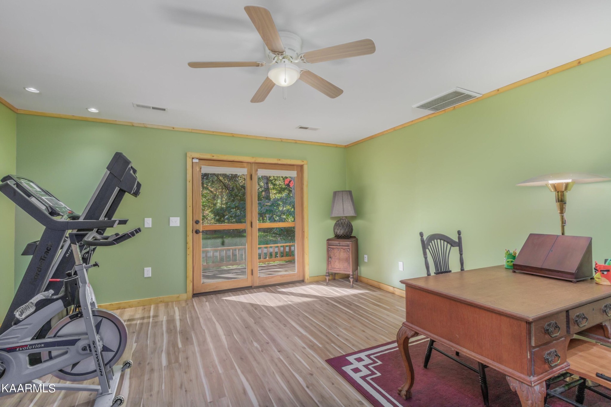 1524 Sandy Ridge Road Dandridge, TN 37725 - Photo 39 of 42 a room with furniture and wooden floor