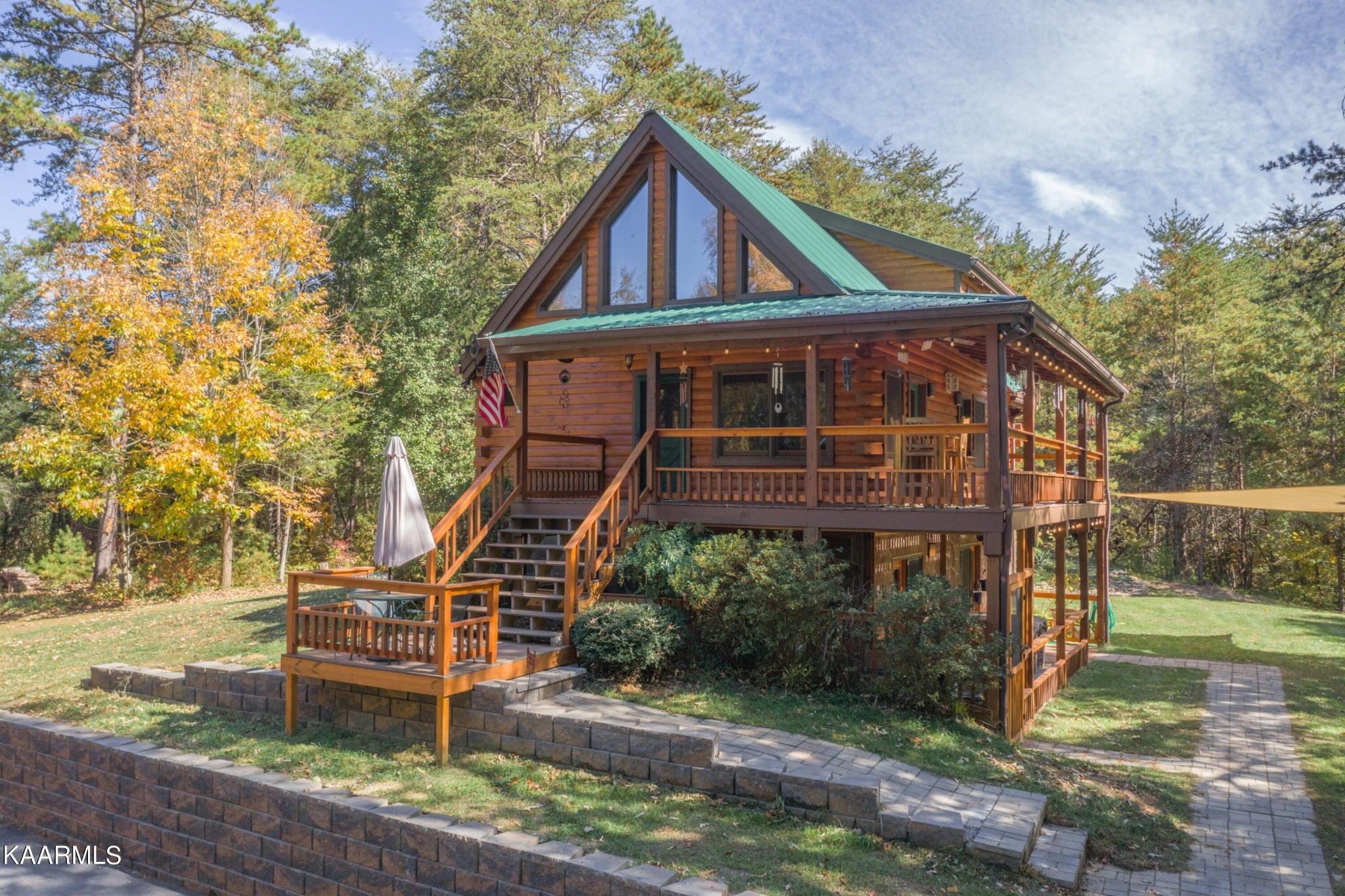 1524 Sandy Ridge Road Dandridge, TN 37725 - Photo 8 of 42 a front view of a house with a yard