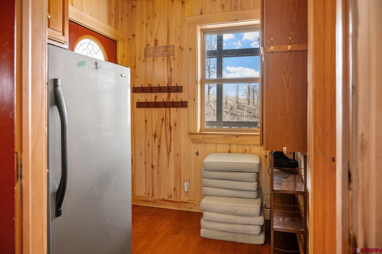 645 Emery Loop Fort Garland, CO 81133 - Photo 11 of 44 a view of walk in closet with empty racks