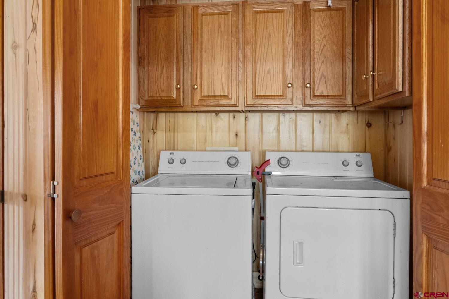 645 Emery Loop Fort Garland, CO 81133 - Photo 12 of 44 a utility room with dryer and washer