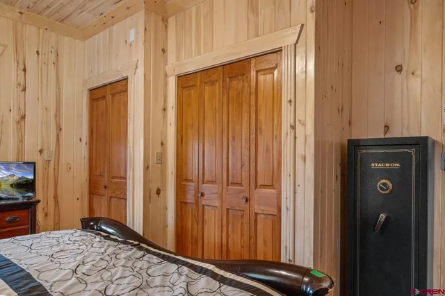 a view of a bedroom with closet area