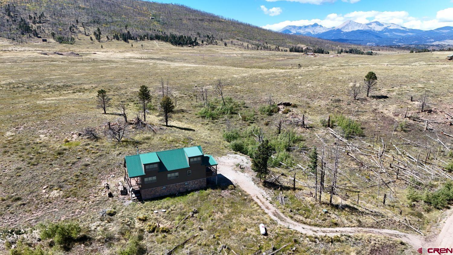 645 Emery Loop Fort Garland, CO 81133 - Photo 2 of 44 a view of lake with mountain