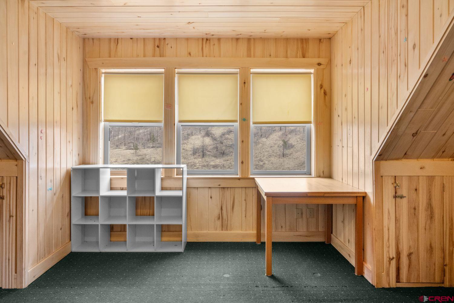 645 Emery Loop Fort Garland, CO 81133 - Photo 27 of 44 a view of an empty room with a window