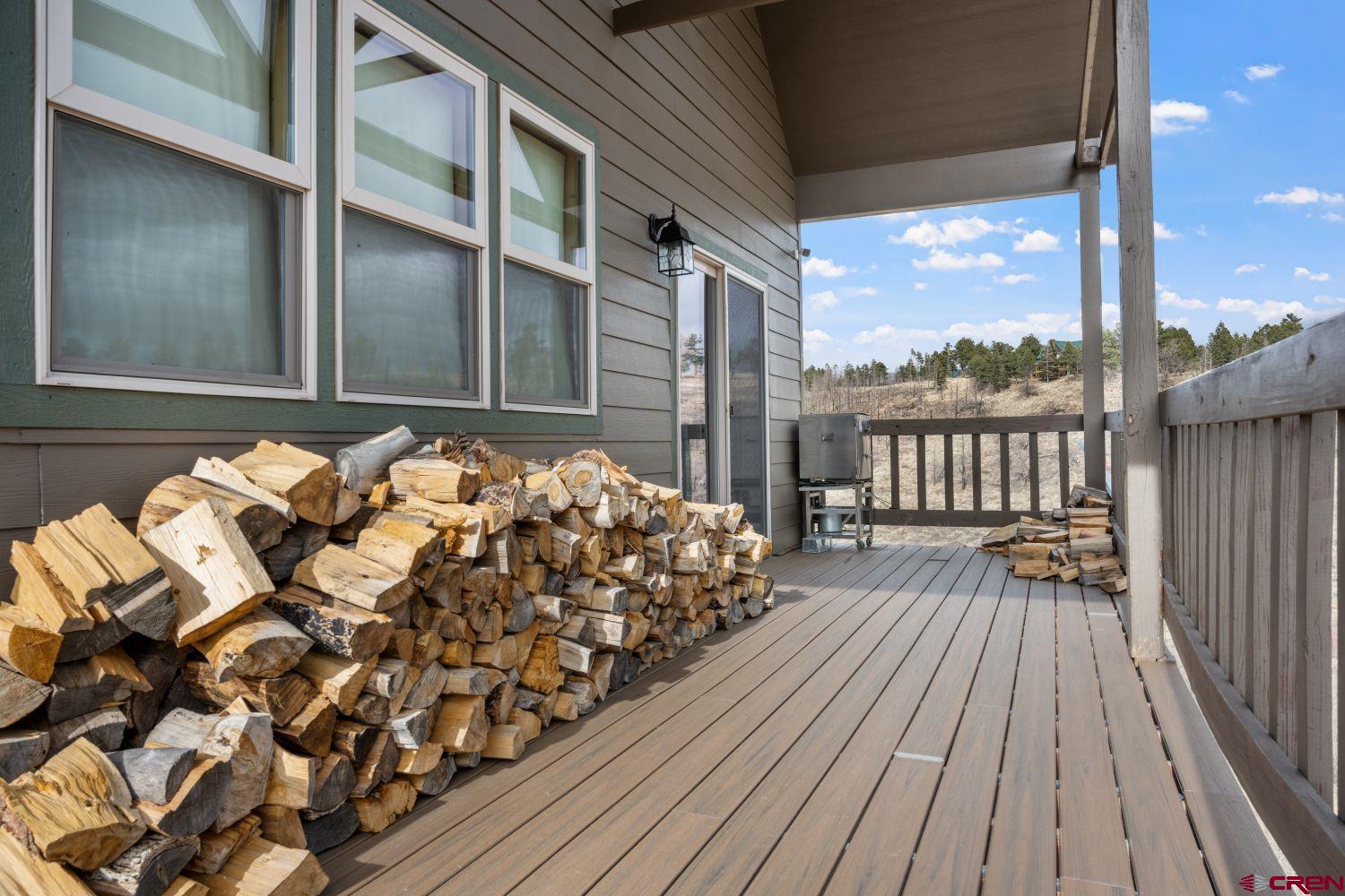645 Emery Loop Fort Garland, CO 81133 - Photo 3 of 44 a balcony with wooden floor