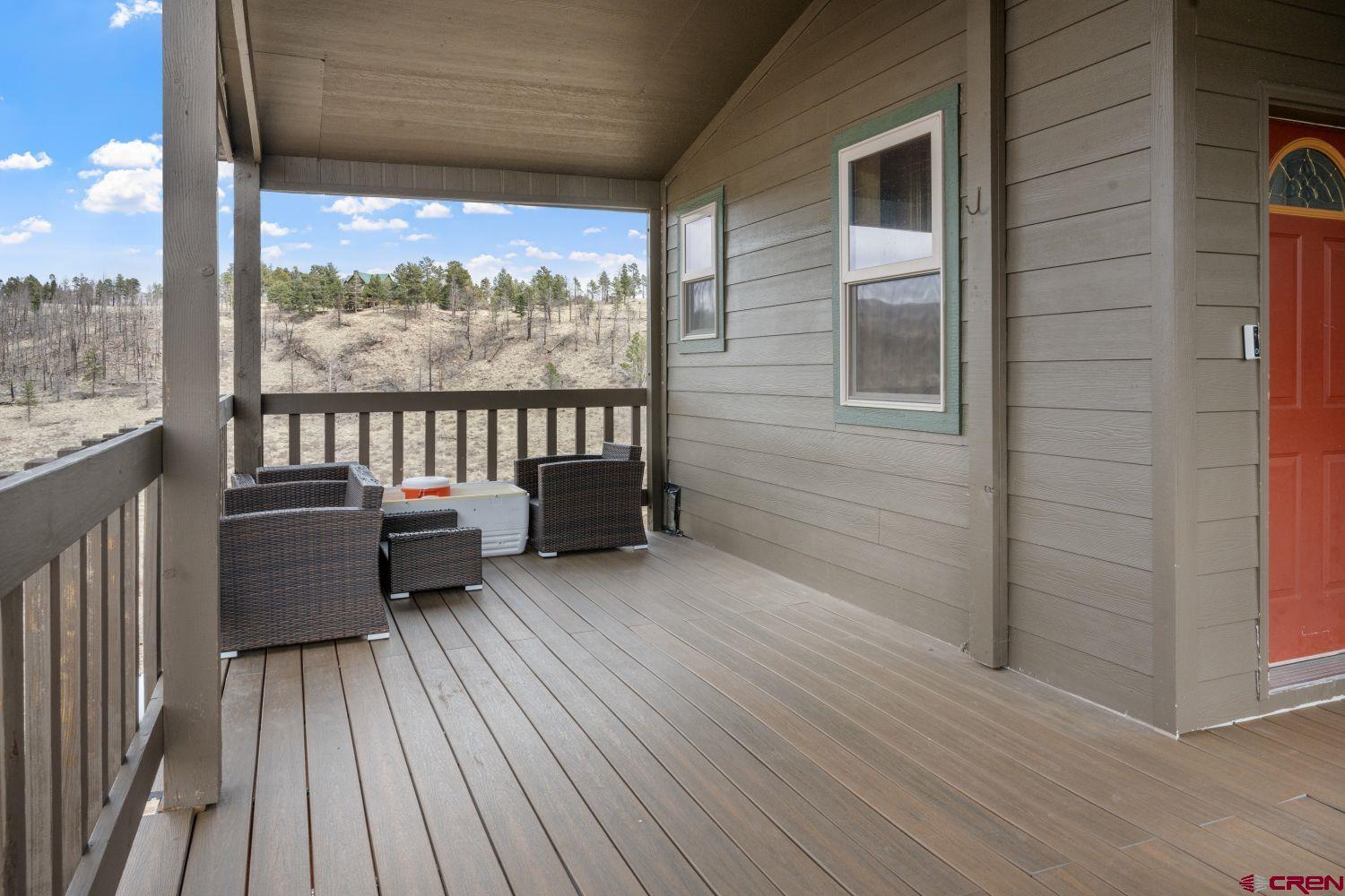 645 Emery Loop Fort Garland, CO 81133 - Photo 36 of 44 a balcony with wooden floor