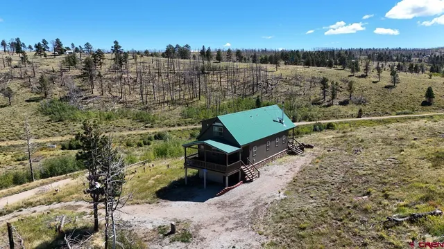 a view of a house with a snow