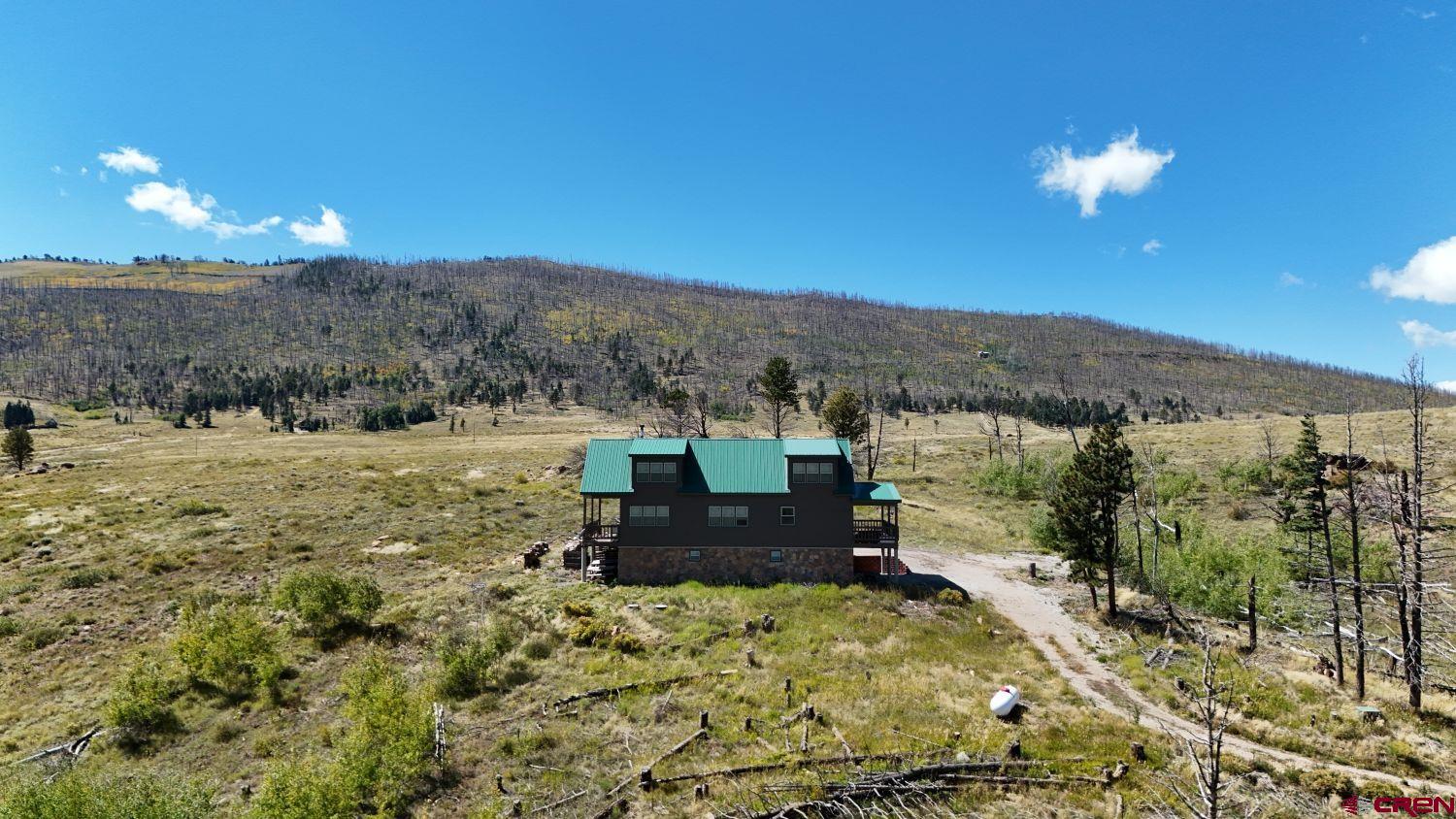 645 Emery Loop Fort Garland, CO 81133 - Photo 41 of 44 a view of a terrace with a mountain