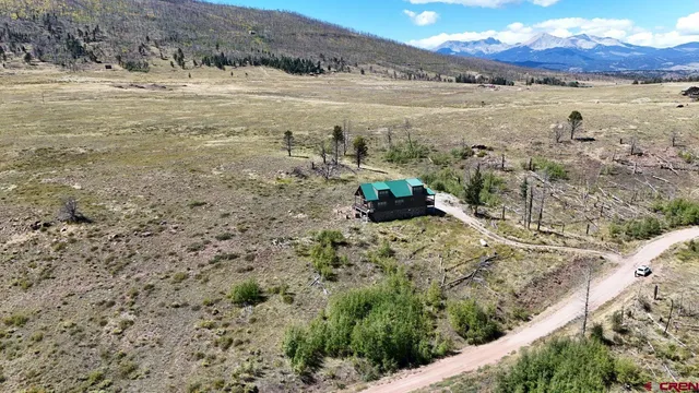 a view of a backyard with a garden