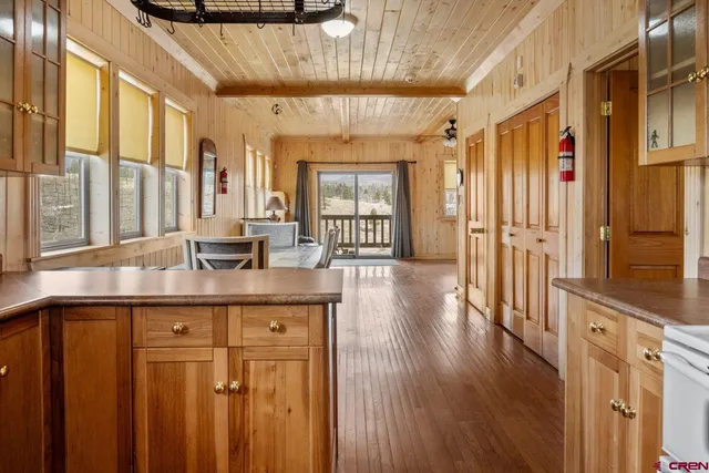 a bathroom with a double vanity sink and a window