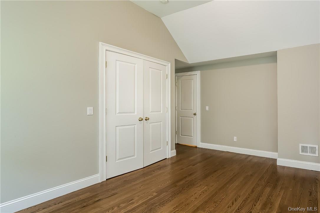20 Walker Avenue Rye, NY 10580 - Photo 13 of 25 a view of an empty room with wooden floor
