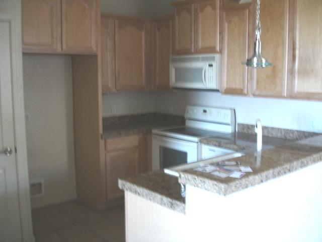7027 North Scottsdale Road, Unit 202 Paradise Valley, AZ 85253 - Photo 2 of 5 KITCHEN