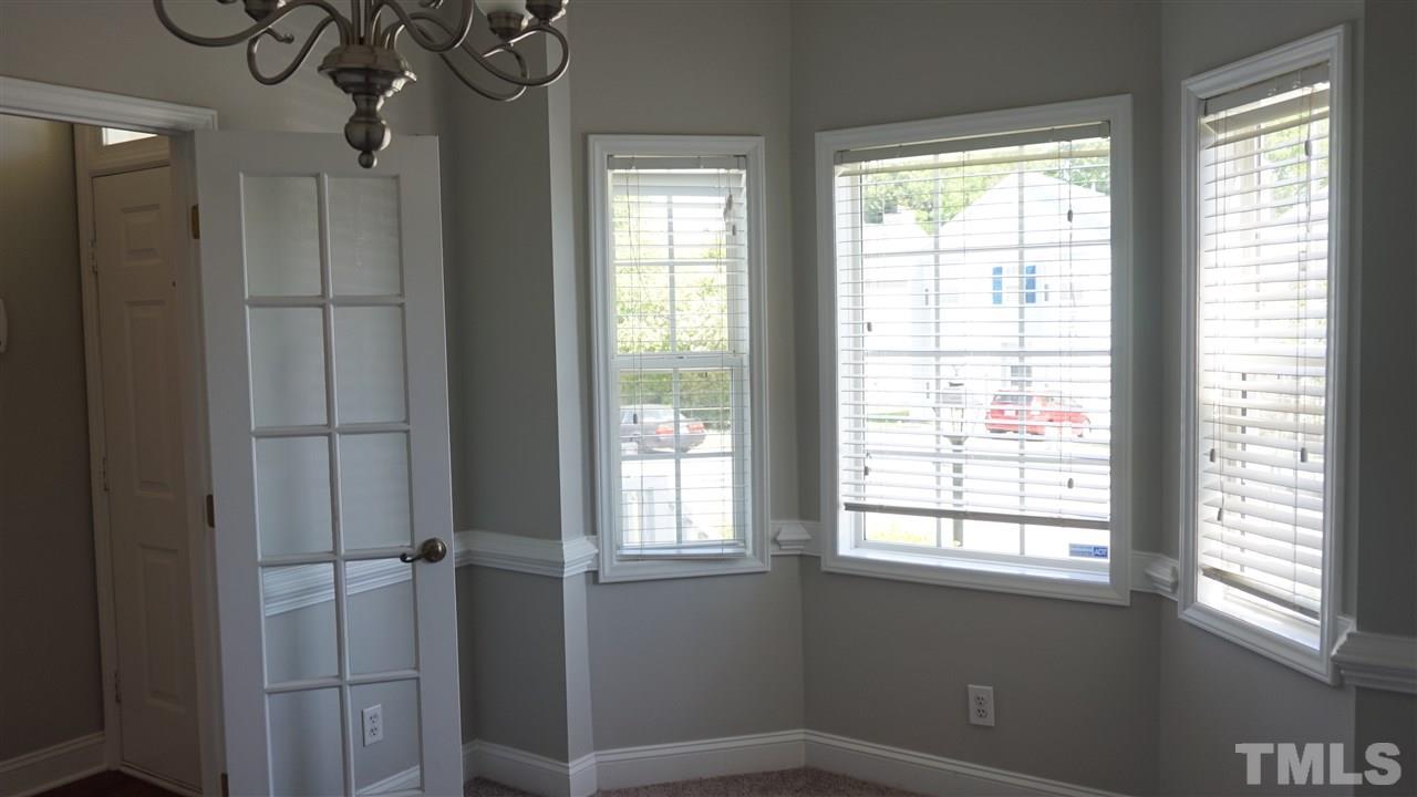 4113 Beaufain Street Raleigh, NC 27604 - Photo 8 of 16 a view of a window in an empty room