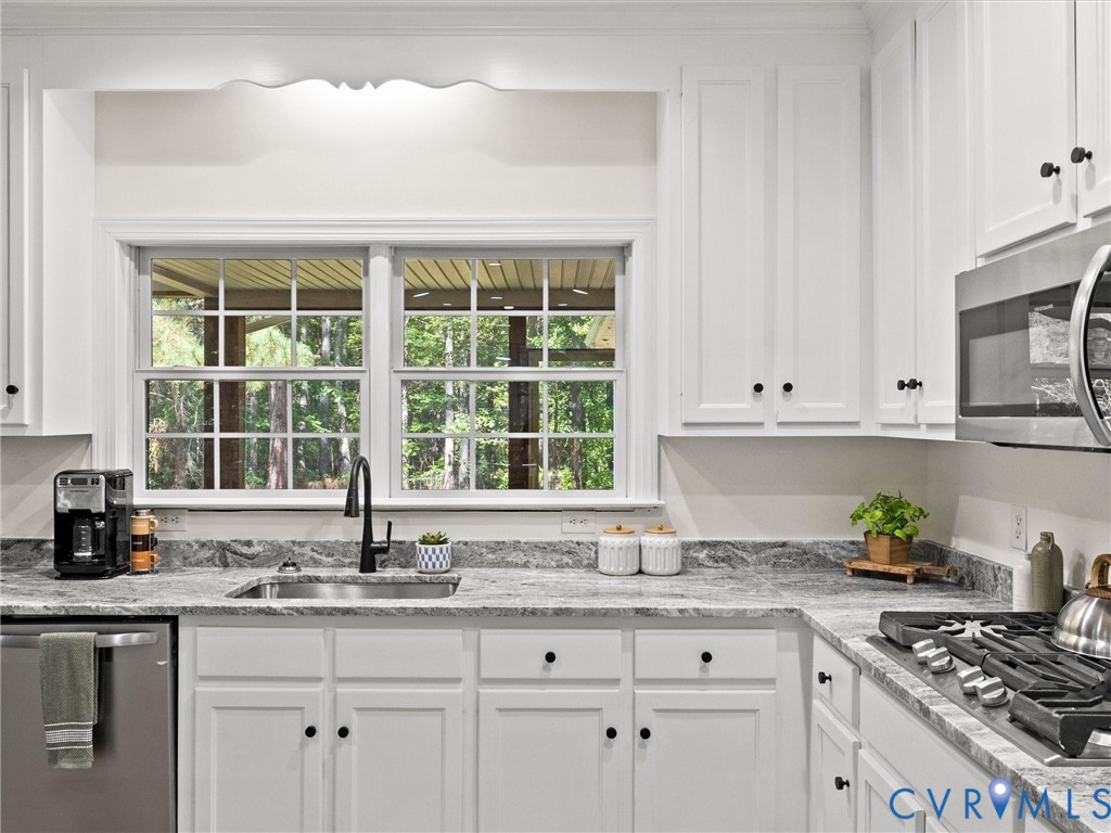12 Henderson Road New Canton, VA 23123 - Photo 19 of 49 White cabinetry with black hardware, light-toned c