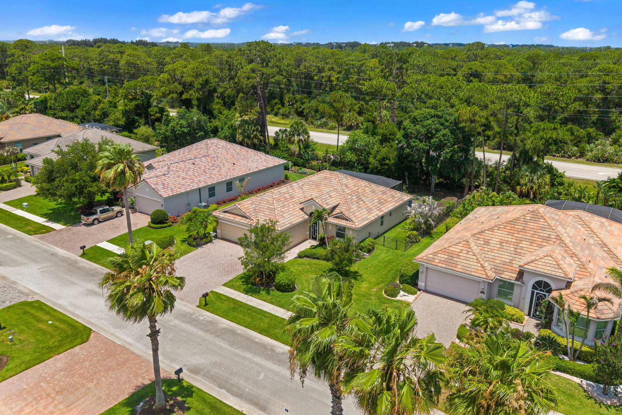 7657 Fieldstone Ranch Square Vero Beach, FL 32967 - Photo 46 of 52 a view of a garden with an house and a street view