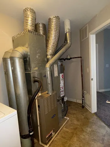 a utility room with dryer and washer