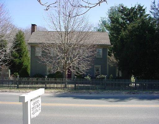 486 Quaker Farms Road Oxford, CT 06478 - Photo 1 of 1 a view of a brick house with iron fence