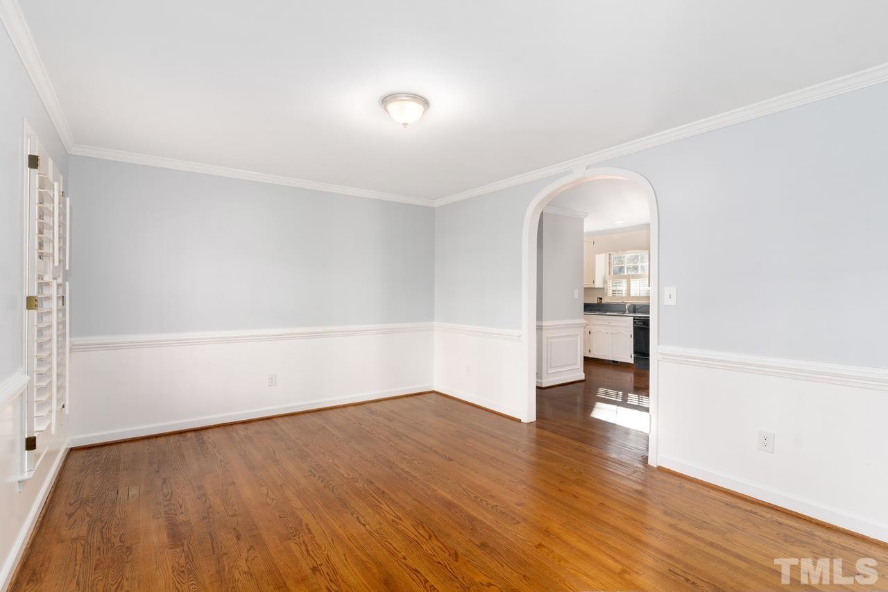 300 Dunstable Court Raleigh, NC 27614 - Photo 7 of 21 wooden floor in an empty room with a window