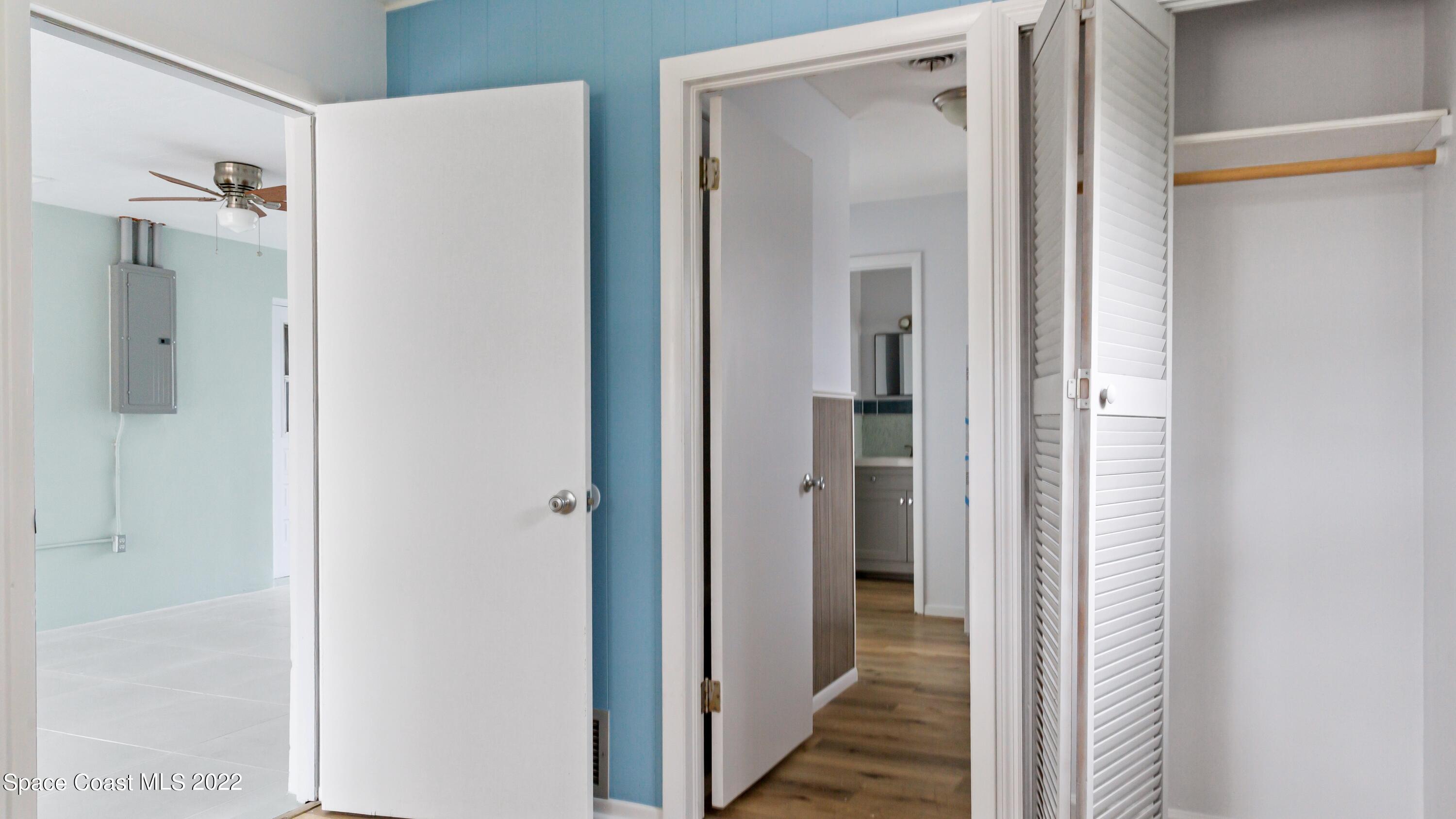 1709 Pinewood Road Melbourne, FL 32934 - Photo 22 of 38 a view of a bathroom from a hallway