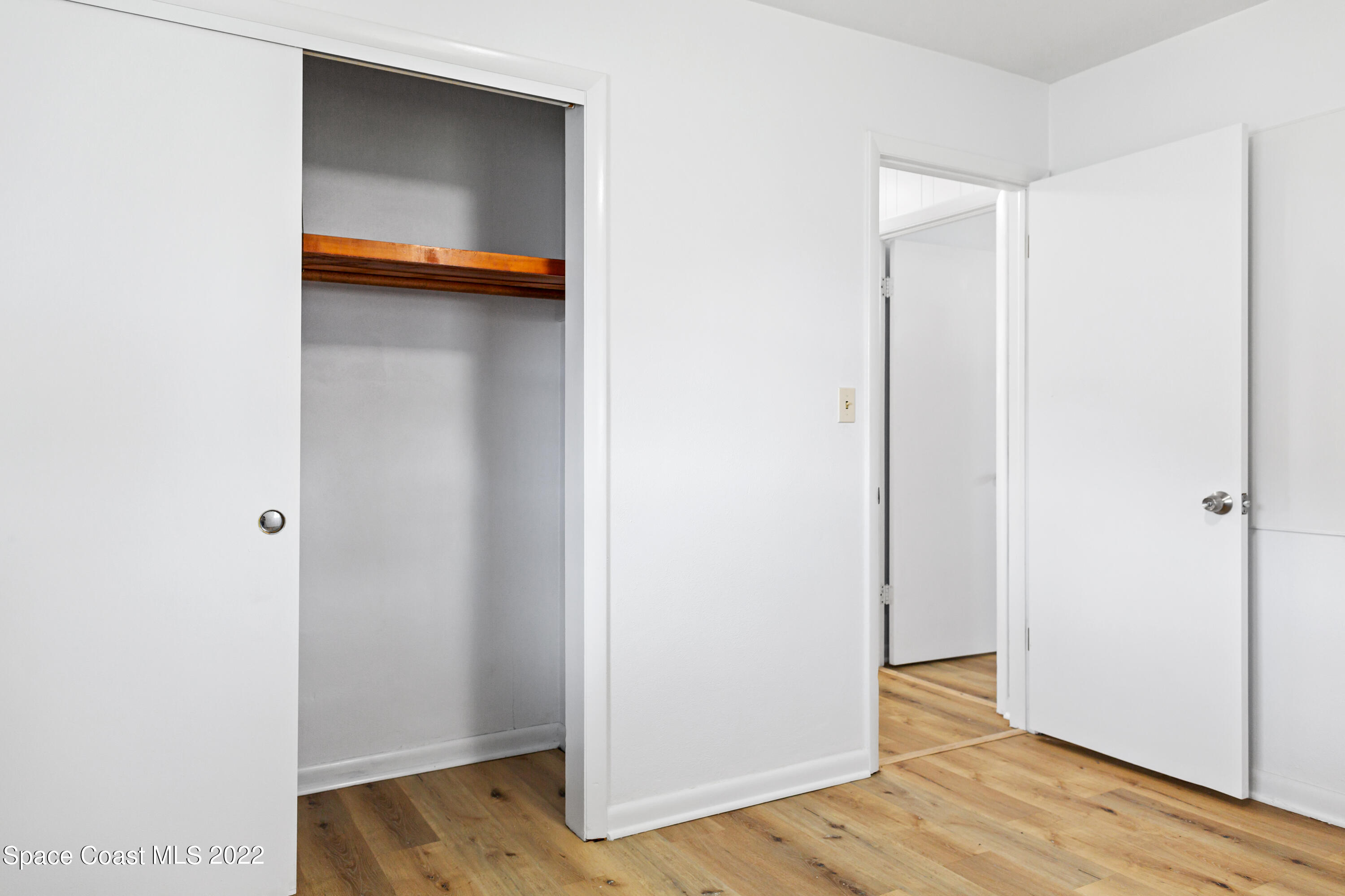 1709 Pinewood Road Melbourne, FL 32934 - Photo 30 of 38 a view of small space with wooden floor