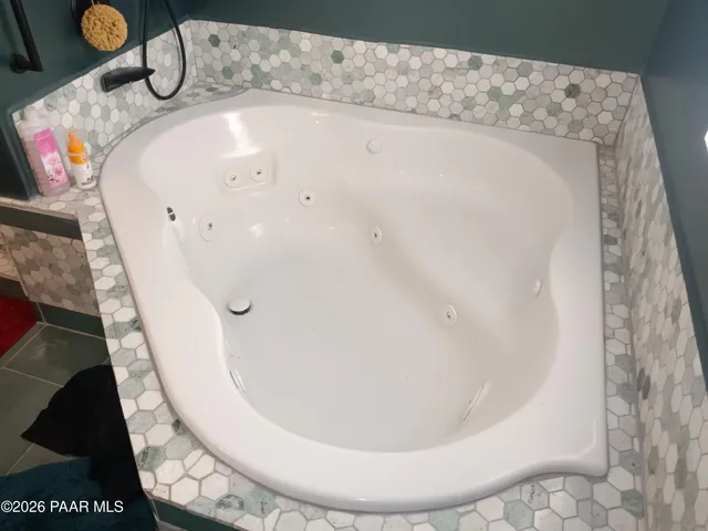 a bathroom with a bathtub