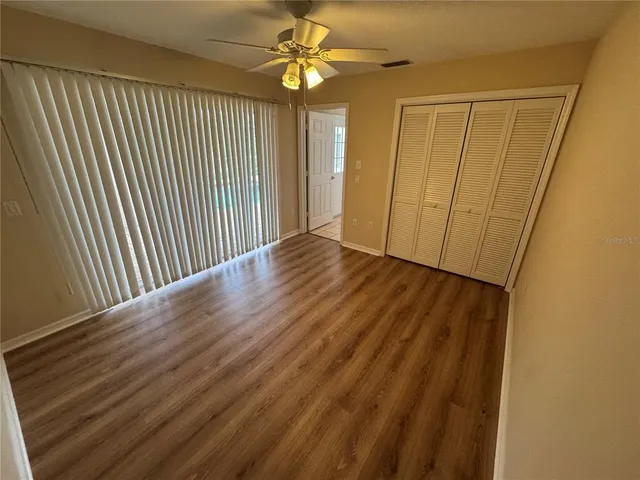 a view of entryway with wooden floor